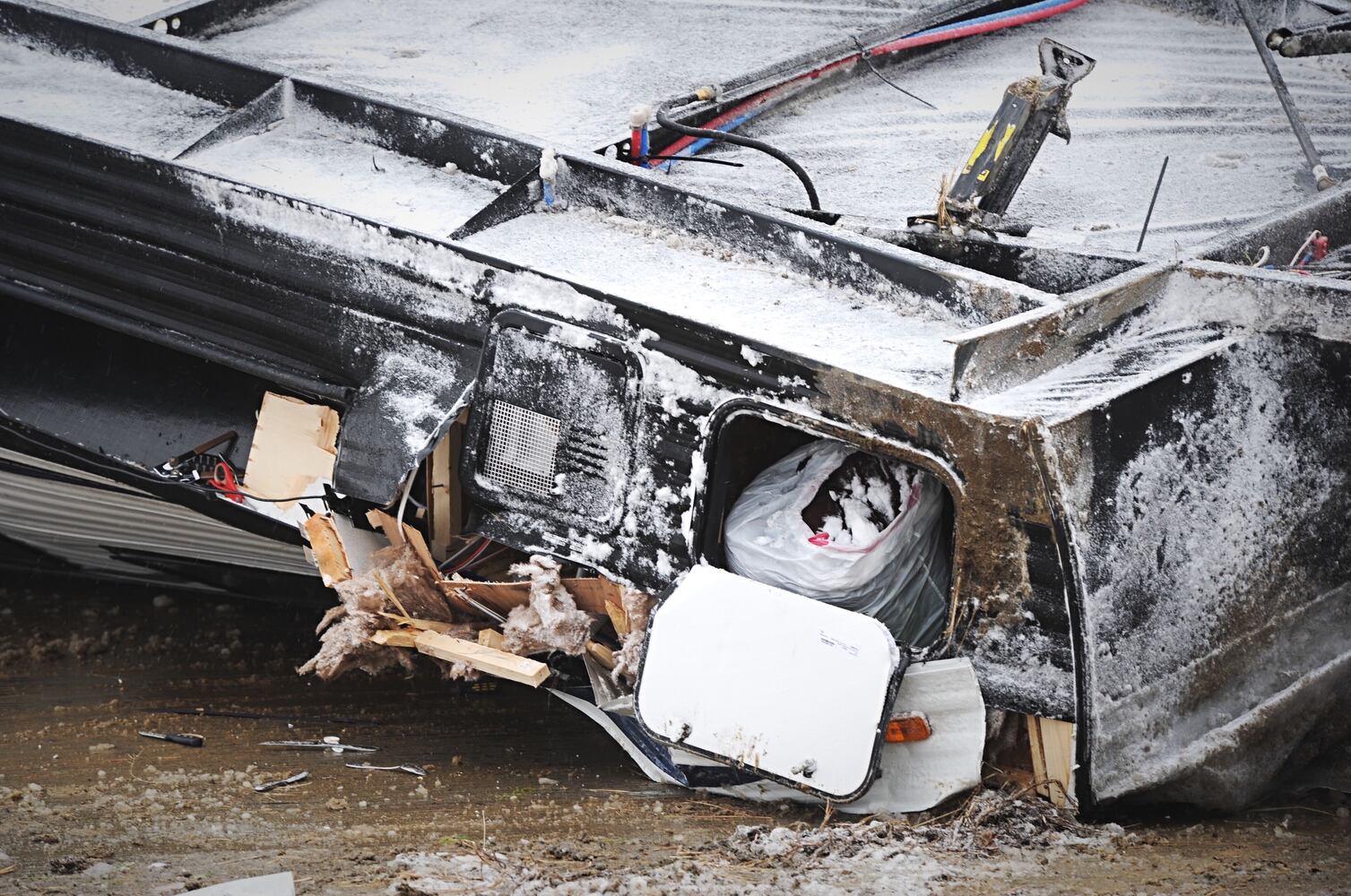 I-70 west ramp closes after trailer rolls over due to slick roads
