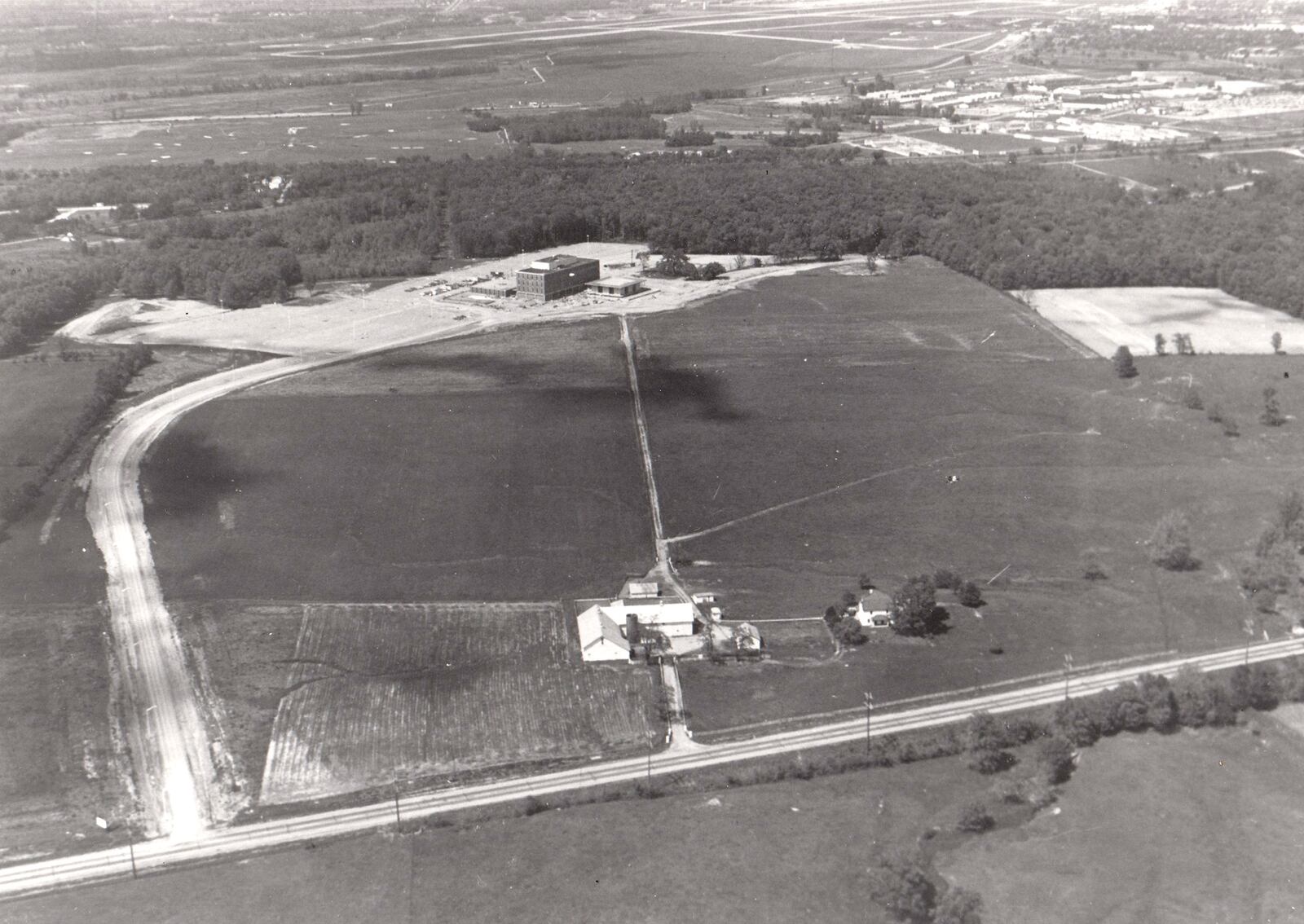 Wright State University opened as a one building Dayton campus of Miami and the Ohio State universities in 1964. Allyn Hall (top) was the first building on the 618-acre campus. DAYTON DAILY NEWS ARCHIVE