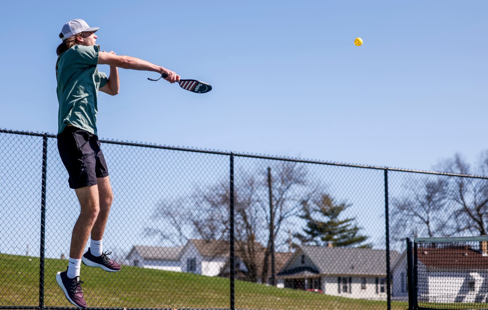 Caden Ward, a senior from Ross, spends a day off school playing pickleball at Officer Bob Gentry Park Monday, March 11, 2024 in Hamilton. NICK GRAHAM/STAFF