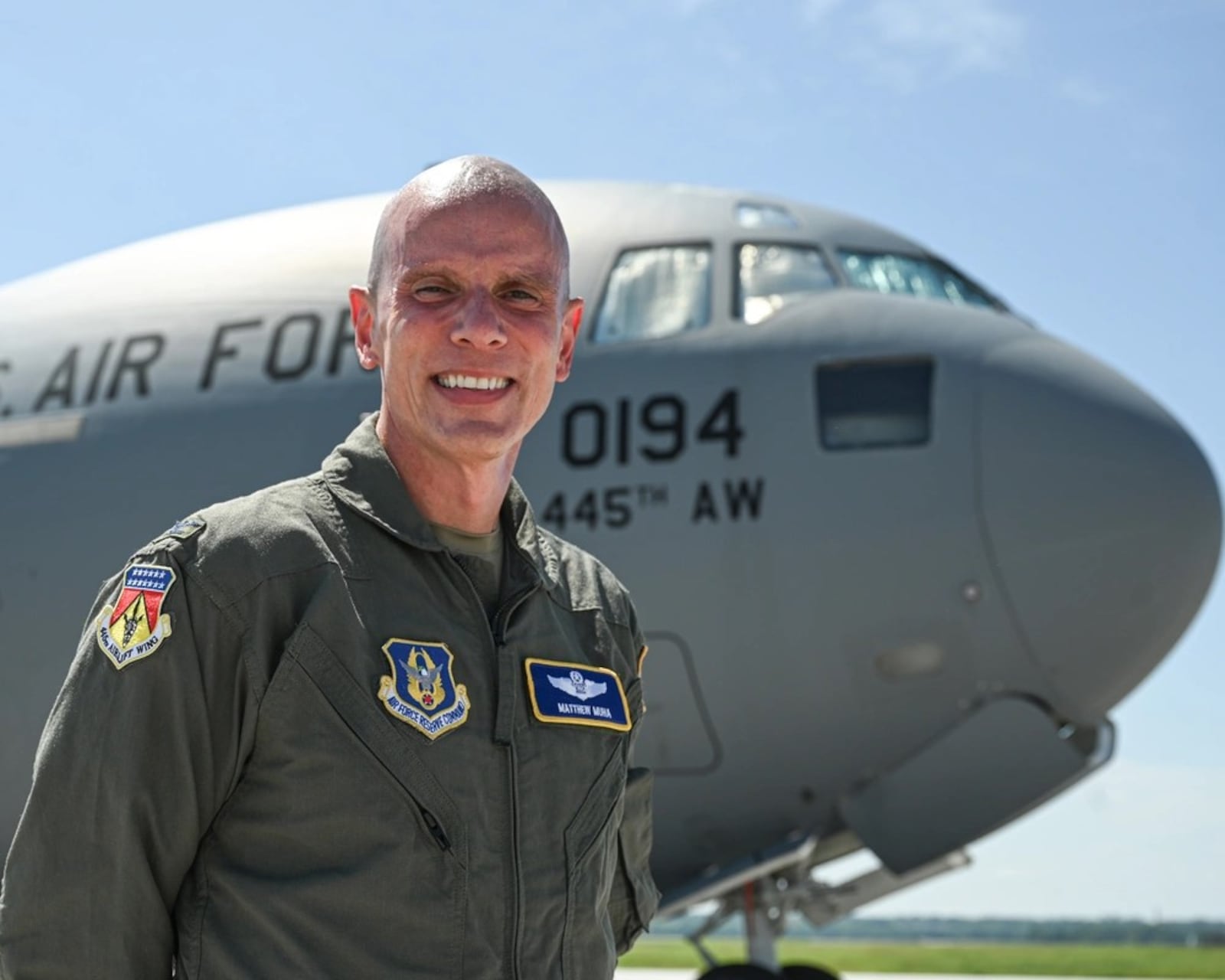 Col. Matthew Muha, 445th Airlift Wing deputy commander, in front of a C-17 Globemaster III aircraft at Wright-Patterson Air Force Base, Aug. 18, 2025. Muha is spearheading Operation Honor, a three-day event at Wright-Patterson that culminates with Honor Flight Dayton where the wing will fly roughly 150 U.S. military veterans to Washington, D.C. and back. (U.S. Air Force photo by Staff Sgt. Johnathan Quiñones)