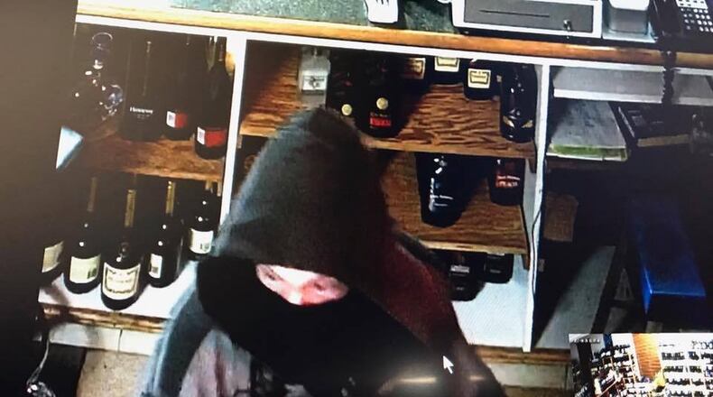 Security cameras at Noonan’s liquor store in Hamilton captured a suspected thief and their car from Wednesday’s break-in. CONTRIBUTED