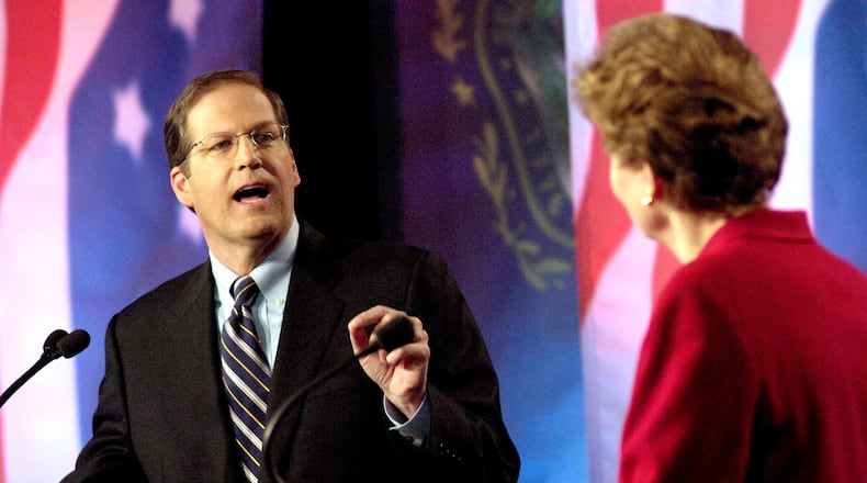FILE - U.S. Sen. John Sununu, R-N.H., left, spars with Democratic rival and former governor Jeanne Shaheen during a live televised debate in Manchester, N.H., Oct. 30, 2008. (AP Photo/POOL/David Lane, File)