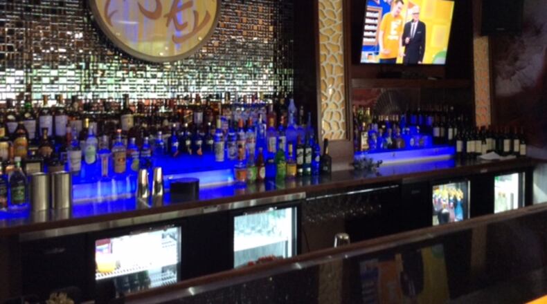 The bar of Sky Asian Cuisine will have an extensive sake list. It will host a grand opening Thursday, June 30 after extensive renovations to the interior of the restaurant at 4090 Wilmington Pike. MARK FISHER/STAFF