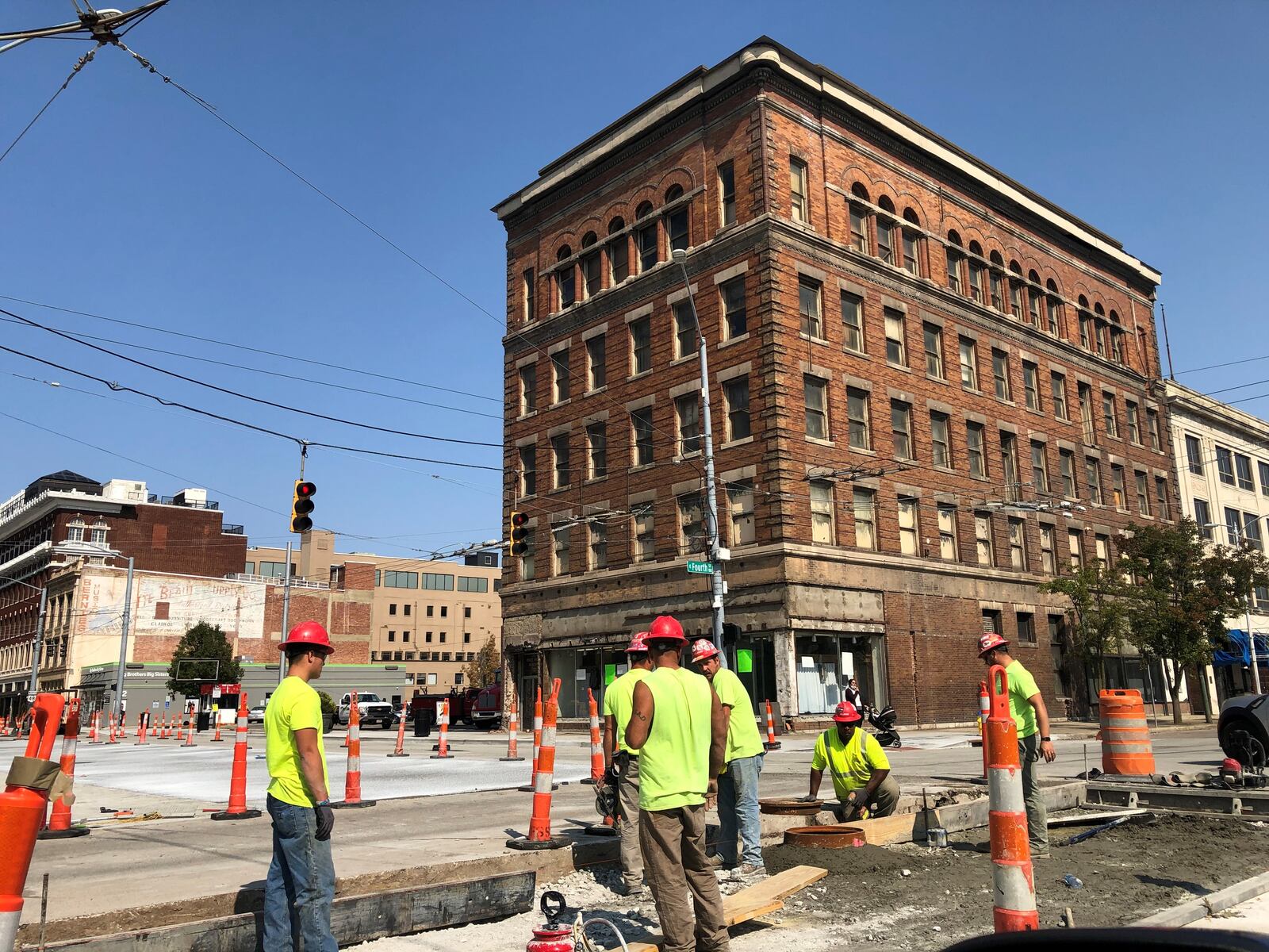 Crews work on East Fourth Street near the intersection of South Jefferson Street last year. CORNELIUS FROLIK / STAFF