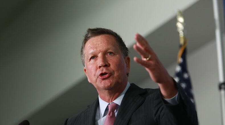 Ohio Gov. John Kasich speaks to the Detroit Economic Club on Monday, April 13, 2015 at Cobo Center in downtown Detroit. Kasich told business leaders in Detroit that that he’s “seriously considering” a race for the 2016 Republican presidential nomination but isn’t setting a timetable for a decision. (Ryan Garza/Detroit Free Press via AP) DETROIT NEWS OUT, TV OUT, INTERNET OUT, MAGS OUT, NO SALES, MANDATORY CREDIT DETROIT FREE PRESS