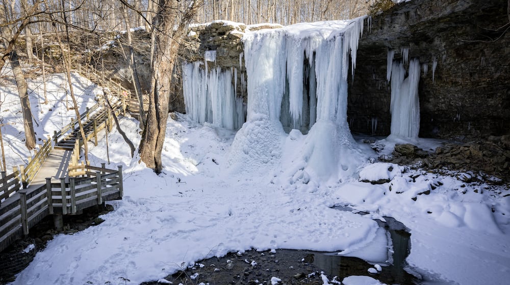 Charleston Falls, which is located in Bethel Township south of Tipp City, is frozen over after weeks of frigid weather in late January and early February. The falls is located in Charleston Falls Preserve, one of the most popular units managed by Miami County Park District. BRYANT BILLING / STAFF
