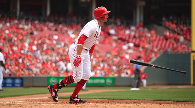 The Reds’ Joey Votto reacts after popping out with the bases loaded against the Nationals on Sunday, July 16, 2017, at Great American Ball Park in Cincinnati. David Jablonski/Staff