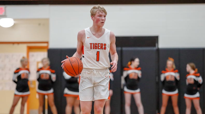 West Liberty-Salem High School senior guard Matthew Loffing dribbles the ball up the floor during a game against West Jefferson. CONTRIBUTED PHOTO BY MICHAEL COOPER