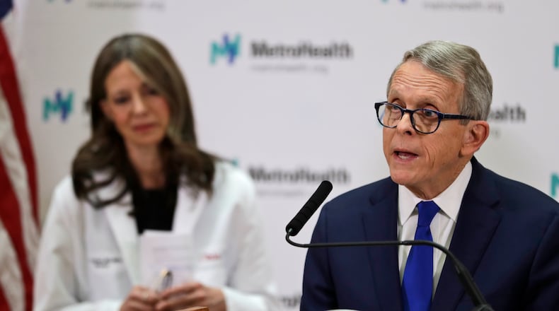 Ohio Governor Mike DeWine gives an update at MetroHealth Medical Center on the state’s preparedness and education efforts to limit the potential spread of a new virus which caused a disease called COVID-19, Thursday, Feb. 27, 2020, in Cleveland. (AP Photo/Tony Dejak)