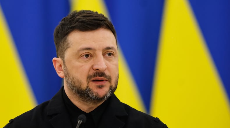 Ukrainian President Volodymyr Zelenskyy speaks during a joint press conference with Lithuania's President Gitanas Nauseda and Polish President Karol Nawrocki, at the Presidential palace in Vilnius, Lithuania, Sunday, Jan. 25, 2026. (AP Photo/Mindaugas Kulbis)