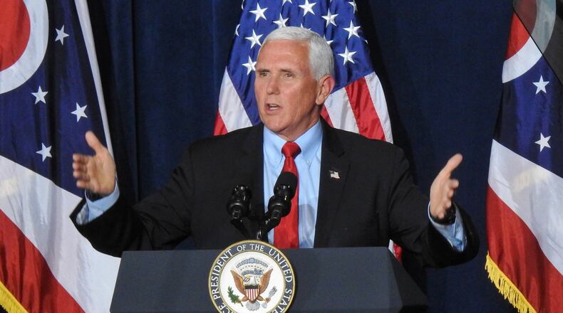 Vice President Mike Pence gestures during a campaign speech Oct. 21, 2020, in Cincinnati. NICK GRAHAM/STAFF