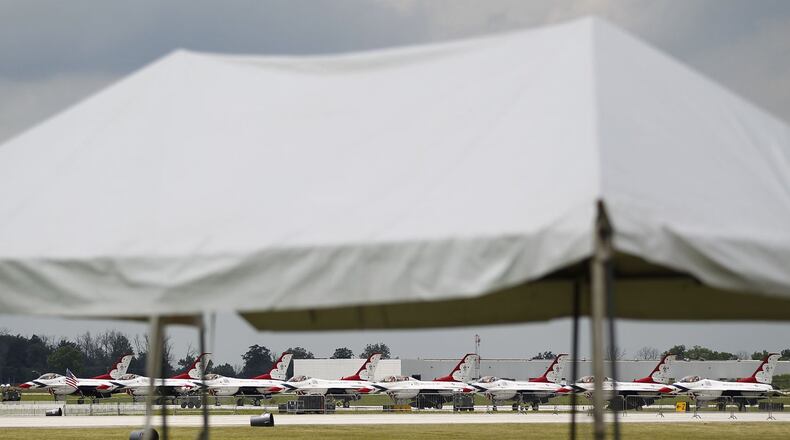 The U.S. Air Force Thunderbirds appear to be under an awning on Wednesday in beforer the Vectren Dayton Air Show this coming weekend. TY GREENLEES / STAFF