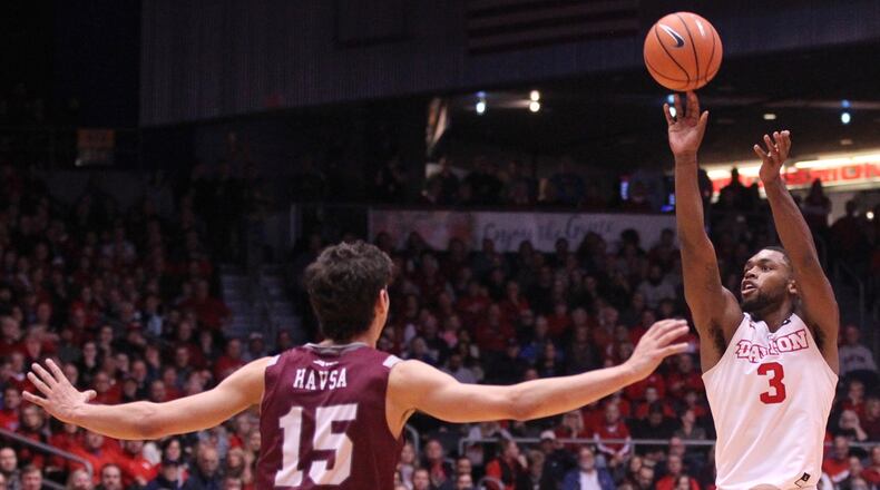 Dayton's Trey Landers shoots a 3-pointer against Fordham on Saturday, Feb. 17, 2018, at UD Arena.