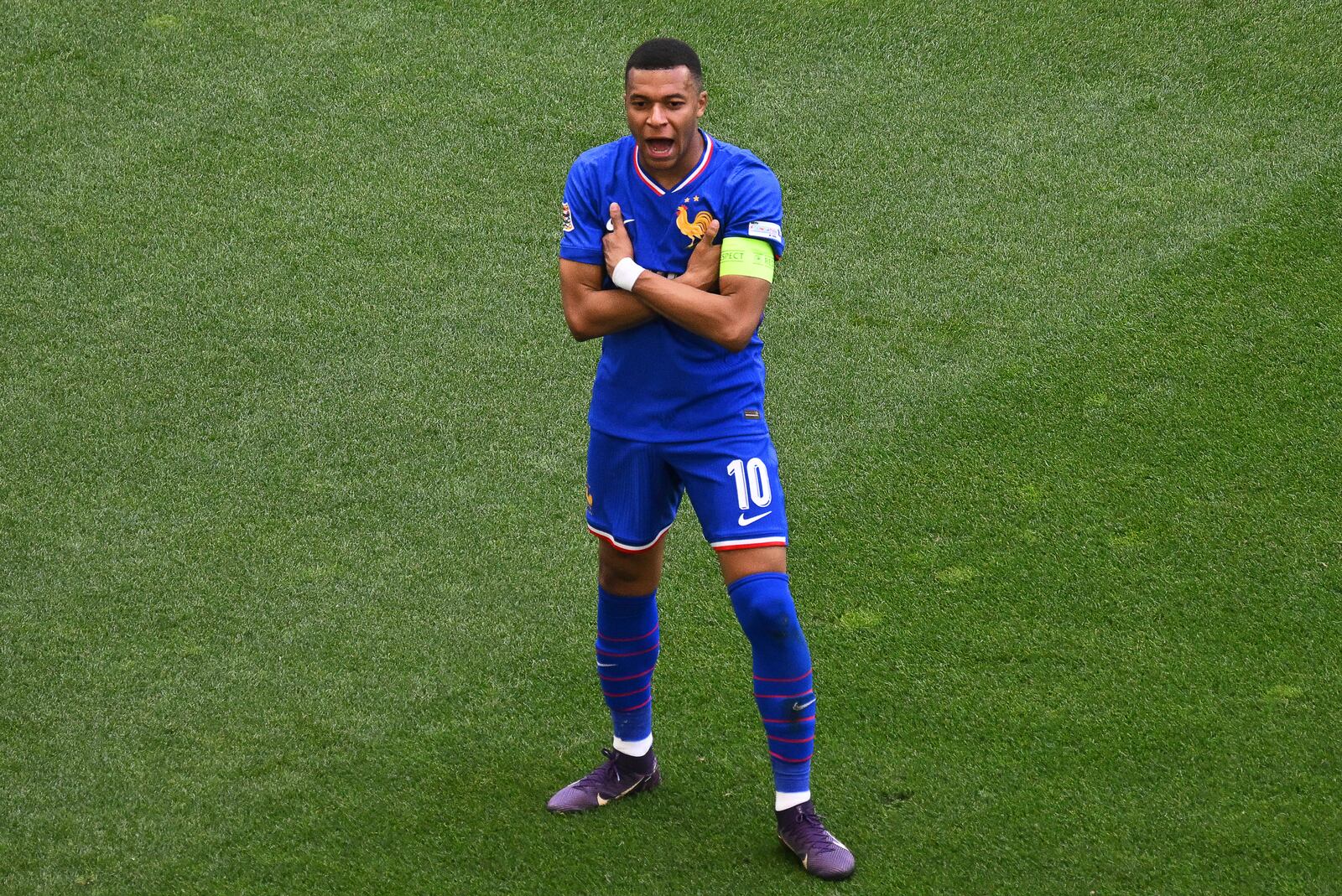 France's Kylian Mbappe celebrates after scoring the opening goal during the Nations League third place soccer match between Germany and France in Stuttgart, Germany, Sunday, June 8, 2025. (Marijan Murat/dpa via AP)