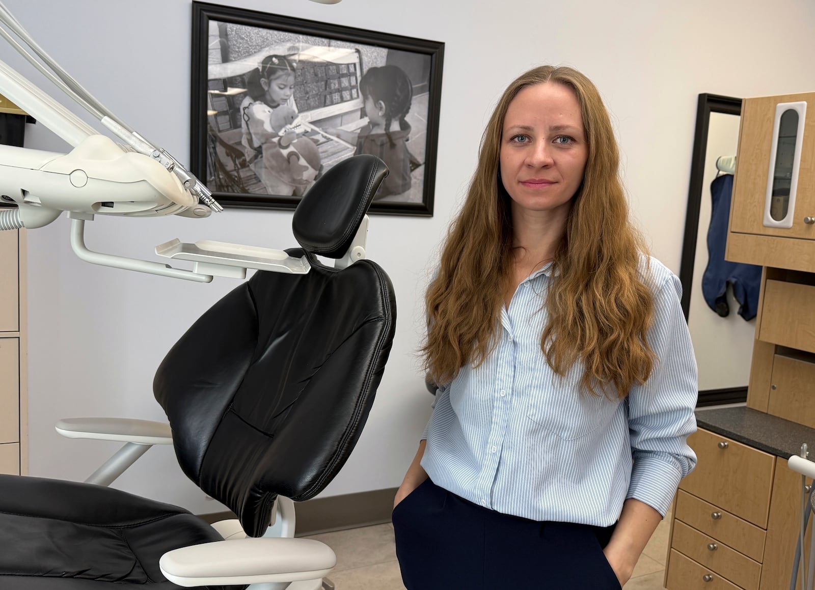 Sasha Harvey, executive director of Salt Lake Donated Dental Services, stands in her clinic that provides free or heavily discounted dental treatment to low-income patients, Monday, May 5, 2025, in Salt Lake City, Utah. (AP Photo/Hannah Schoenbaum)
