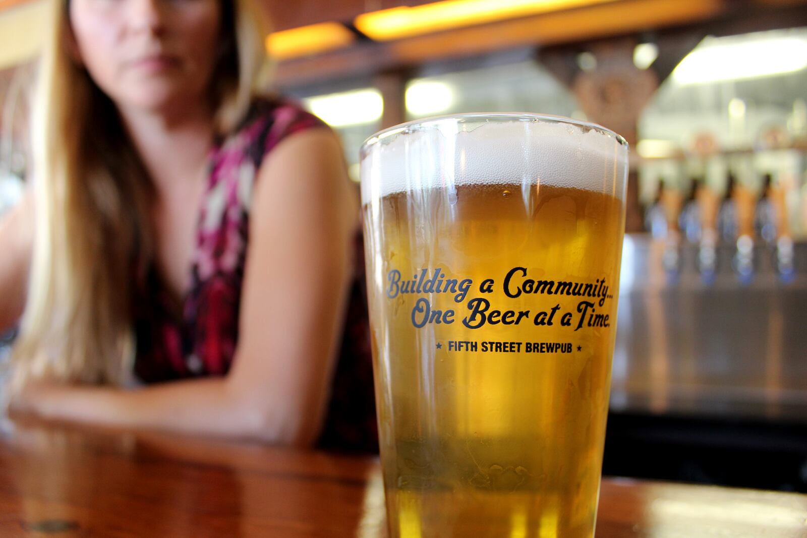 Fifth Street Brewpub has raised $50,000 for local charities since it launched its giveback Monday program in 2013.  Tanya Brock is the pub's general manager.