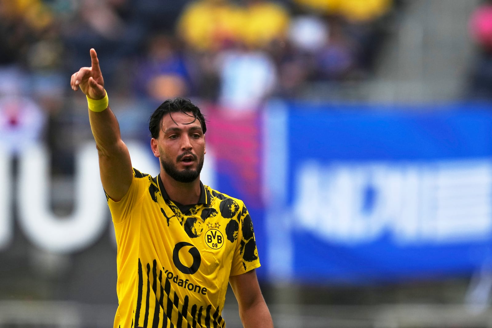 Borussia Dortmund's Ramy Bensebaini reacts during the Club World Cup Group F soccer match between Borussia Dortmund and Ulsan in Cincinnati, Wednesday, June 25, 2025. (AP Photo/Jeff Dean)