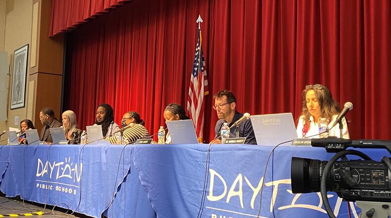 Members of the Dayton Public School Board meet on July 11 at Belmont High School. Eileen McClory / Staff