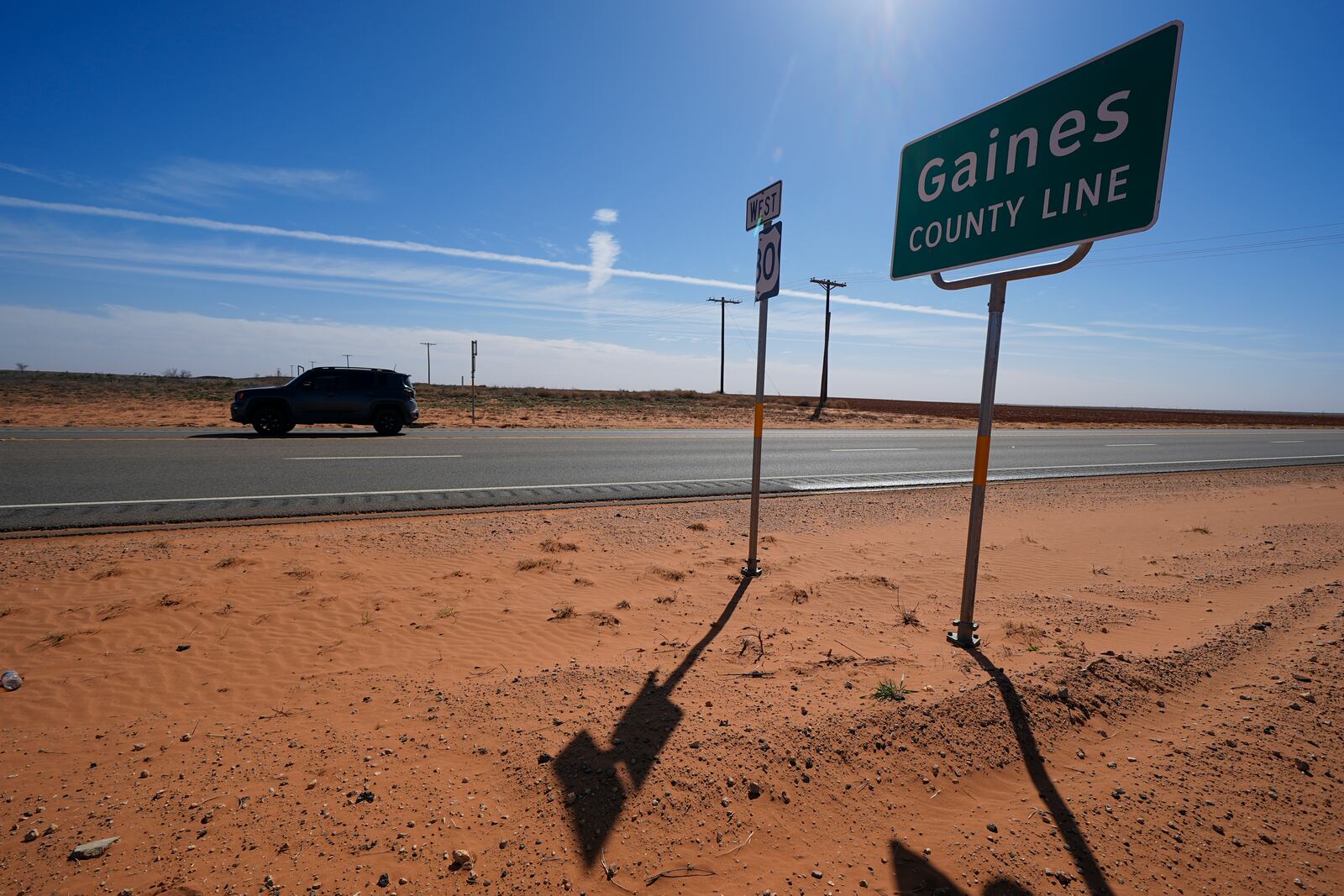 FILE - The Gaines County line is seen along Route 180 Wednesday, Feb. 26, 2025, in Lamesa, Texas. (AP Photo/Julio Cortez, File)