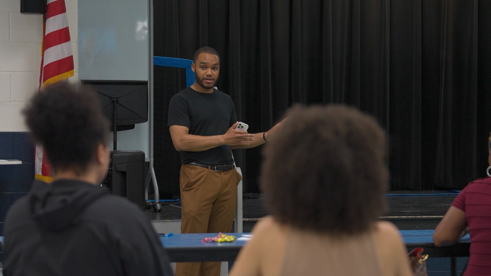 Mikal Toliver, a home lending advisor for Chase Bank in Dayton, talks to a room of people in the Twin Towers neighborhood about how to become a homeowner. He is featured in a June 23 episode of Brick by Brick written and edited by Hernz Laguerre Jr. CONTRIBUTED