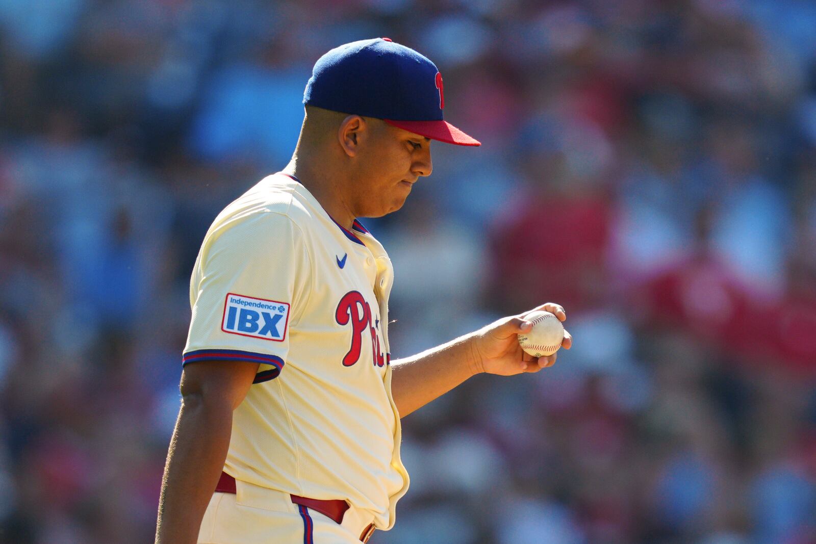 Philadelphia Phillies pitcher Ranger Suárez reacts after giving up a solo home run to Cincinnati Reds' Will Benson during the fifth inning of a baseball game, Saturday, July 5, 2025, in Philadelphia. (AP Photo/Derik Hamilton)