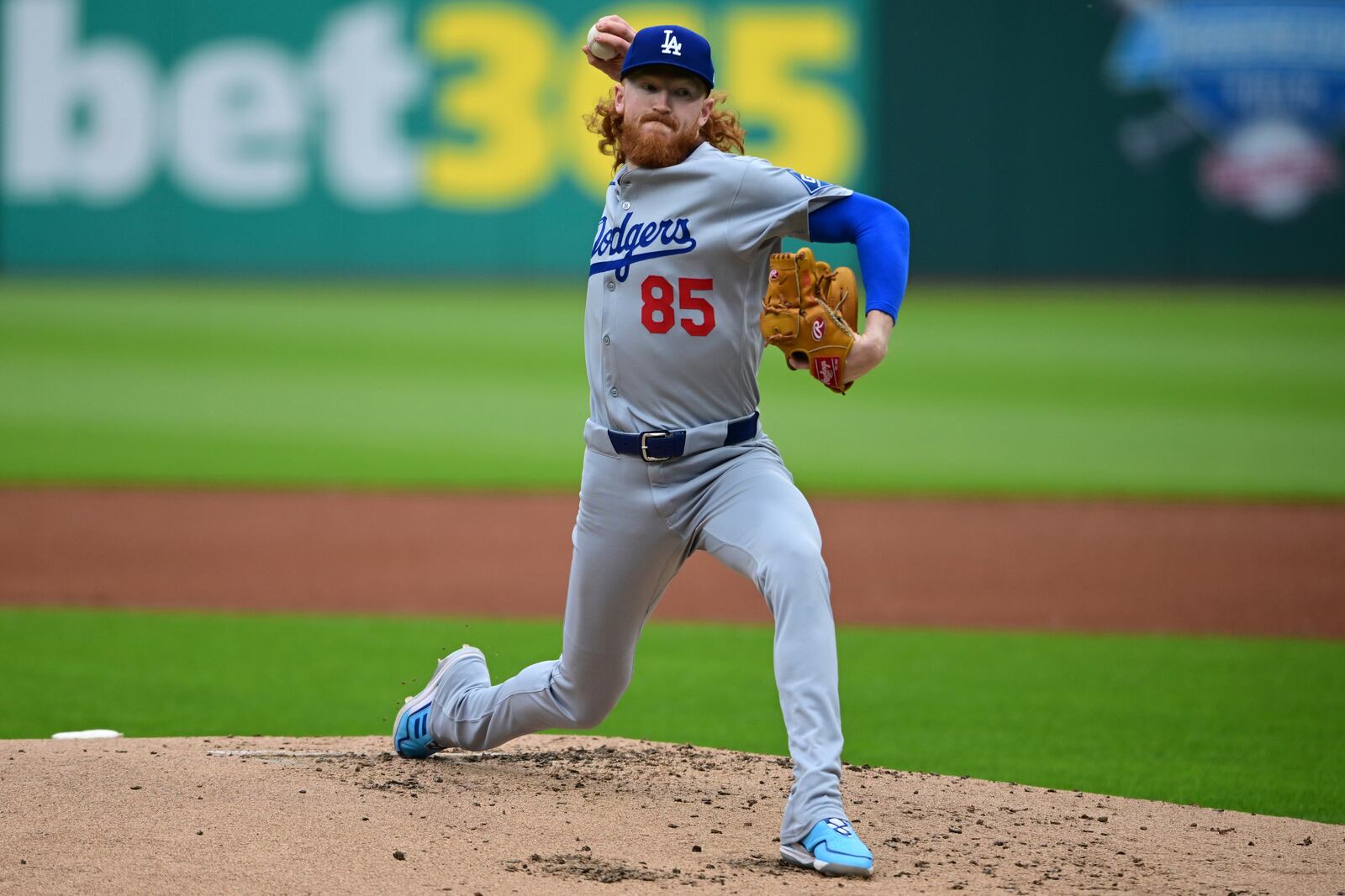 Los Angeles Dodgers starting pitcher Dustin May delivers during the first inning of a baseball game against the Cleveland Guardians, Tuesday, May 27, 2025, in Cleveland. (AP Photo/David Dermer)