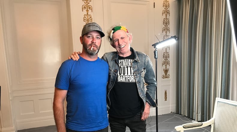 A guy from Dayton and a rock star: Dayton filmmaker Allen Farst with Rolling Stones guitarist Keith Richards in a 2017 photo. The cigarette dangling from Farst’s lips is meant as a joke. CONTRIBUTED