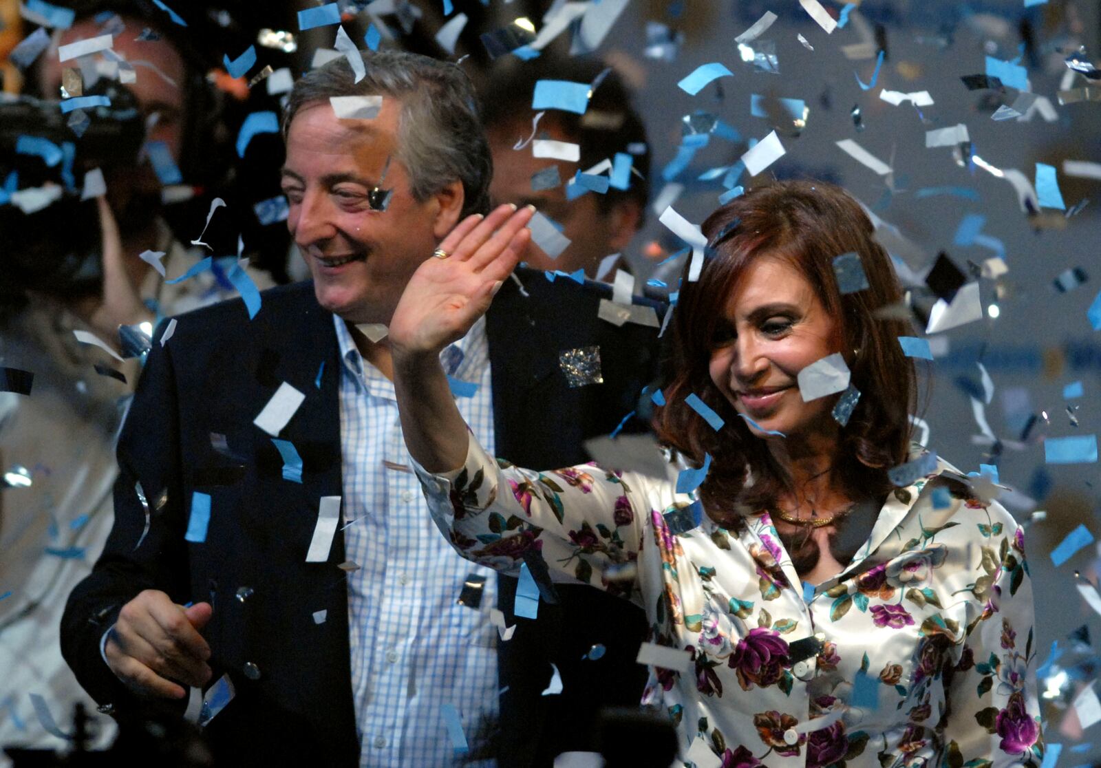 FILE - Argentine presidential candidate Cristina Fernandez de Kirchner, right, and Argentina's President Nestor Kirchner wave to supporters at their headquarters in Buenos Aires, Argentina, Oct. 28, 2007. (AP Photo/Daniel Luna, File)