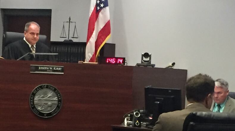 During a court hearing Wednesday in Warren County Juvenile Court, the 12-year-old boy accused of triggering a lockdown during a Springboro Junior High school dance in November admitted to making false alarms. This picture was taken at an earlier hearing in the case. STAFF/LAWRENCE BUDD