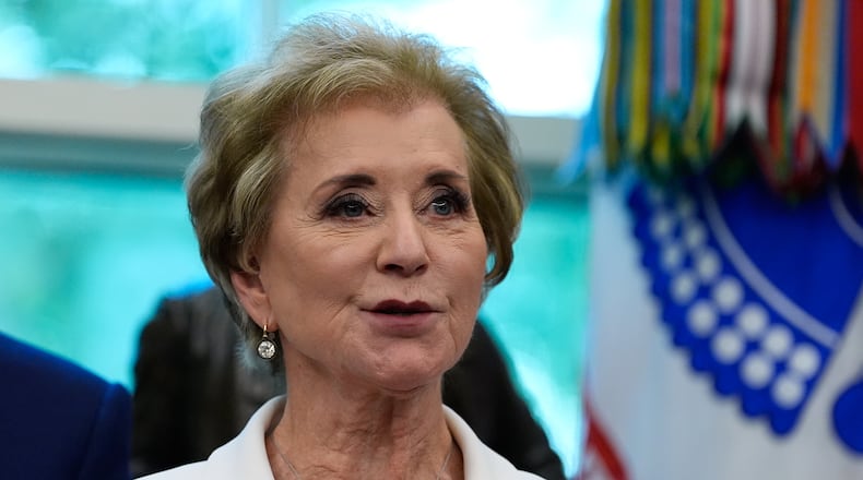 Education Secretary Linda McMahon speaks in the Oval Office of the White House before President Donald Trump signs an executive order regarding childhood cancer and the use of AI, Tuesday, Sept. 30, 2025, in Washington. (AP Photo/Alex Brandon)