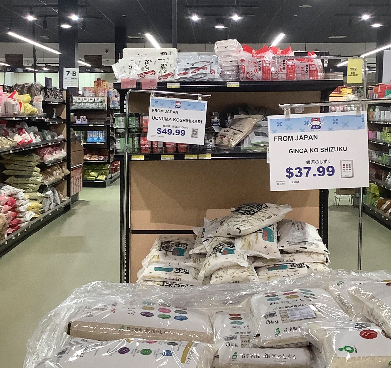 Bags of rice are stacked for sale at the Mitsuwa Marketplace in Edgewater, N.J., Monday, April 7, 2025. (AP Photo/Pablo Salinas)