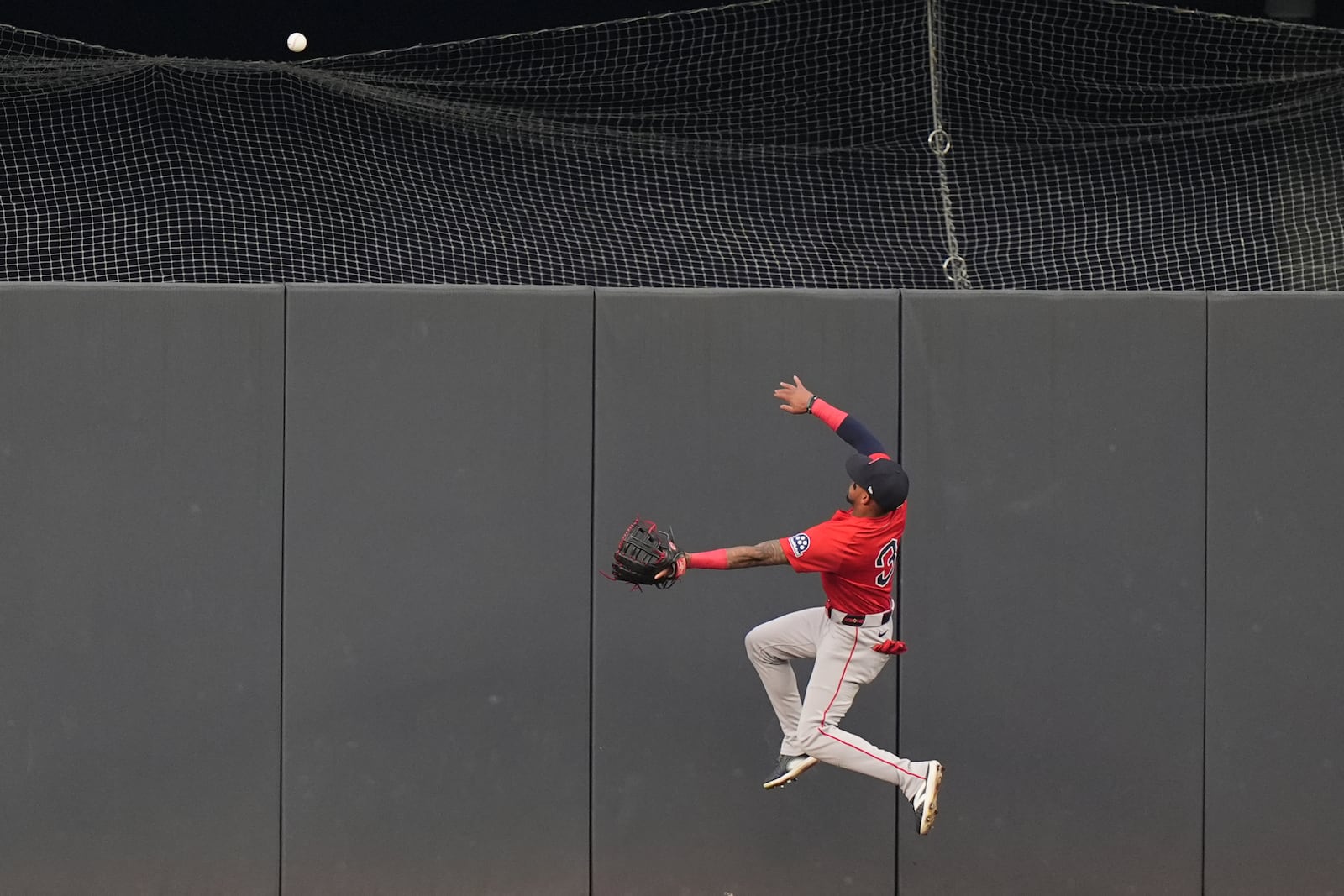 Boston Red Sox's Ceddanne Rafaela (3) chases a ball hit by New York Yankees' Jazz Chisholm Jr. for a three-run home run during the first inning of a baseball game, Friday, June 6, 2025, in New York. (AP Photo/Frank Franklin II)