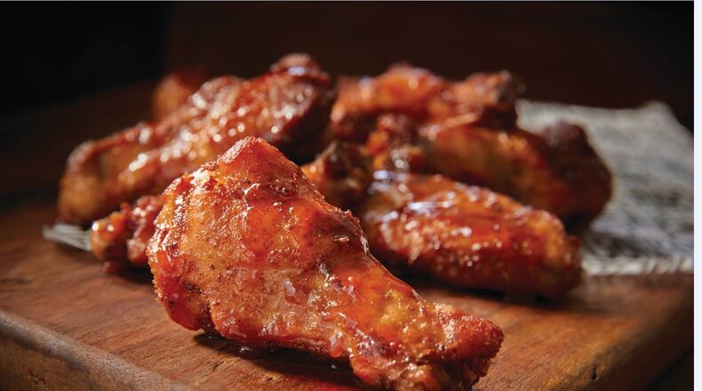 Smokey Bones, a barbecue restaurant on Miller Lane in Butler Twp., has added two new "virtual" restaurants with expanded chicken-wing and burger options for delivery only. CONTRIBUTED PHOTO