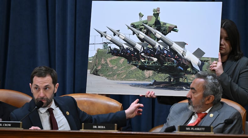 Rep. Jason Crow (D-Colo.) questions witnesses in front of an image of a surface-to-air missile system during a hearing on global threats before the House Intelligence Committee in Washington on Wednesday, March 26, 2025. The Atlantic on Wednesday released more of the group chat among senior Trump administration officials in which they discussed U.S. military plans to strike Houthi targets in Yemen, a day after senior officials said there was nothing classified in the messages. (Kenny Holston/The New York Times)