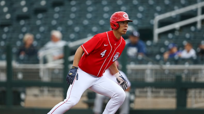 Cincinnati Reds’ Shogo Akiyama, of Japan, takes a lead off of first base during the first inning of a spring training baseball game against the Los Angeles Dodgers Monday, March 2, 2020, in Goodyear, Ariz. (AP Photo/Ross D. Franklin)