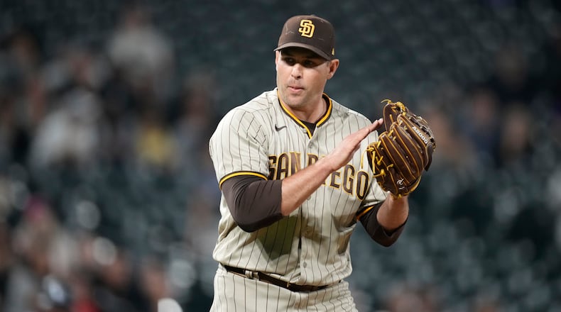 San Diego Padres relief pitcher Craig Stammen reacts after getting Colorado Rockies' Brian Serven to ground out to end the ninth inning of a baseball game Saturday, Sept. 24, 2022, in Denver. (AP Photo/David Zalubowski)