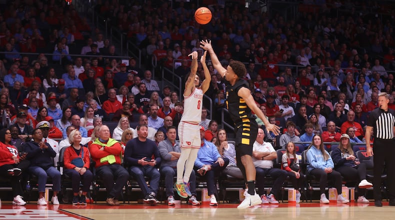 Dayton's Javon Bennett makes a 3-pointer in the first half against Bethune-Cookman on Saturday, Nov. 15, 2025, at UD Arena. David Jablonski/Staff