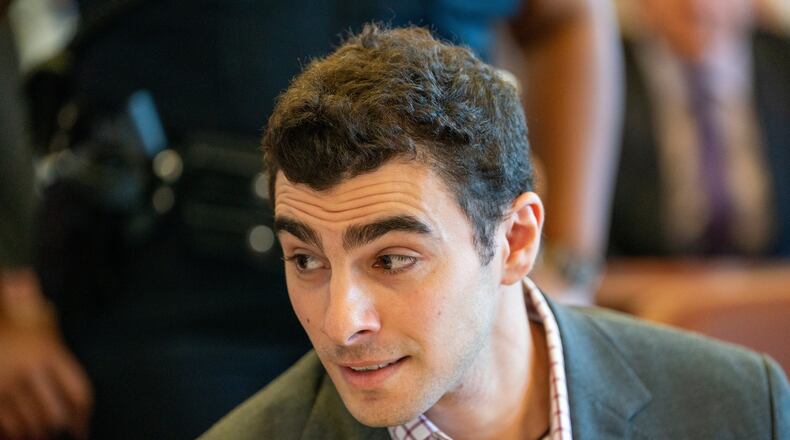 Luigi Mangione, center, appears in court for an evidence hearing, Monday, Dec. 1, 2025, in New York. (Steven Hirsch/New York Post via AP, Pool)