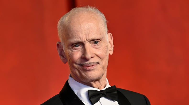 John Waters arrives at the Vanity Fair Oscar Party on Sunday, March 10, 2024, at the Wallis Annenberg Center for the Performing Arts in Beverly Hills, Calif. (Photo by Evan Agostini/Invision/AP)