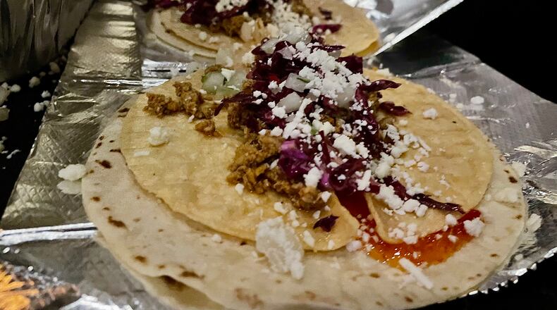 The Miami Valley Restaurant Association’s Sneak Peek to Winter Restaurant Week at The Steam Plant in Dayton featured 12 establishments serving unique dishes for foodies to try. NATALIE JONES/STAFF