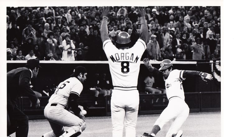 Outfielder Cesar Geronimo scores during a close play at the plate in the 1976 World Series. FILE PHOTO