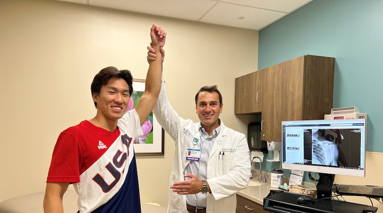 Vincent Meng shows off his repaired and healed left shoulder thanks to the help of his surgeon Dr. Blake Daney. Seven months after his surgery to repair a torn labrum and biceps tendon, Vincent went to the Kuo Shu World Championships in Rome, Italy and won his fourth world title and his second in kuo shu lei tai (traditional Chinese kick boxing). CONTRIBUTED