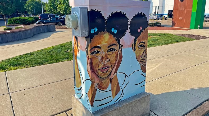 "Wise Ones" by Zuri Ali Cole is among the latest round of ArtWraps in downtown Dayton. CONTRIBUTED