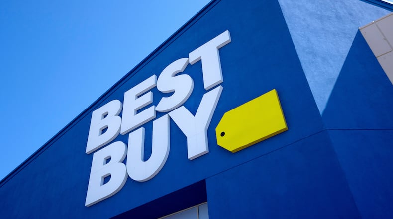 FILE - A Best Buy logo is shown at a store in Dallas on Oct. 25, 2024. (AP Photo/Tony Gutierrez, File)