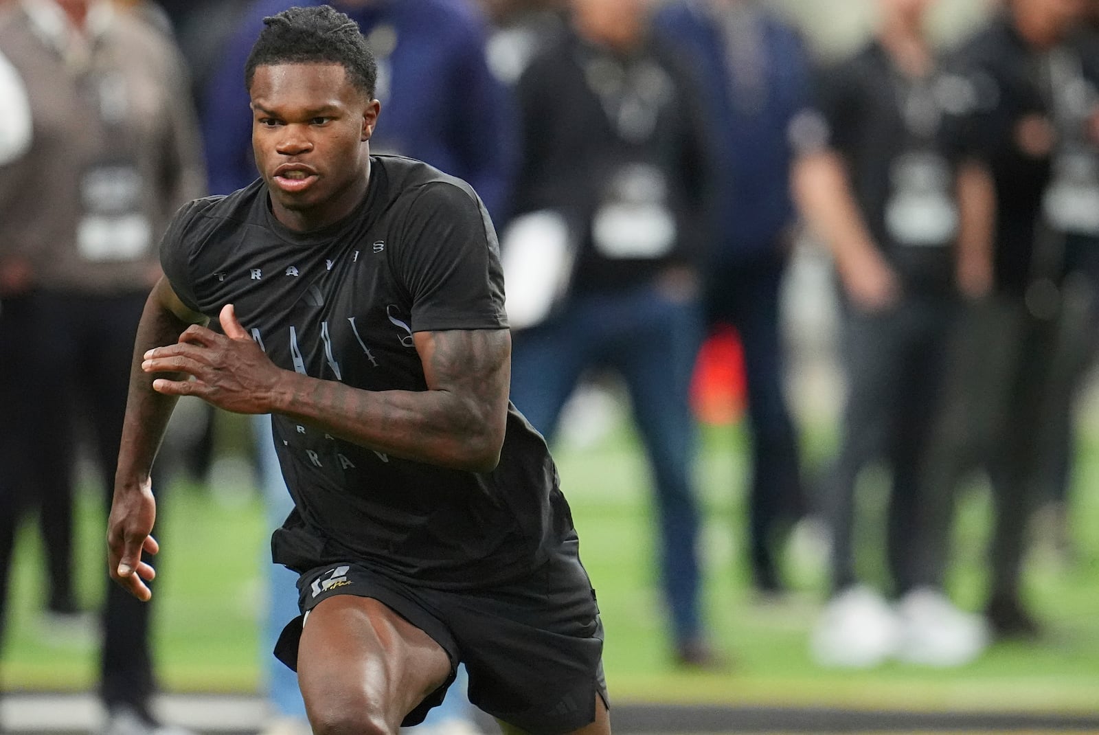 Colorado wide receiver Travis Hunter takes part in a drill during Colorado's NFL football pro day Friday, April 4, 2025, in Boulder, Colo. (AP Photo/David Zalubowski)