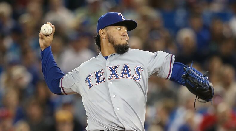 Yovani Gallardo pitches for the Rangers against the Blue Jays on June 27, 2015 at Rogers Centre in Toronto, Ontario, Canada. (Photo by Tom Szczerbowski/Getty Images)