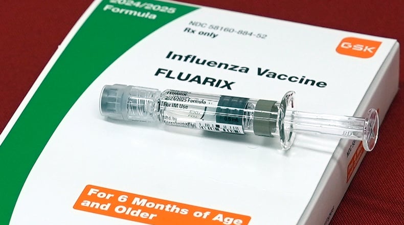 FILE: A flu vaccine is displayed at a pharmacy in New York, on Tuesday, Sept. 24, 2024. (AP Photo/Mary Conlon, File)