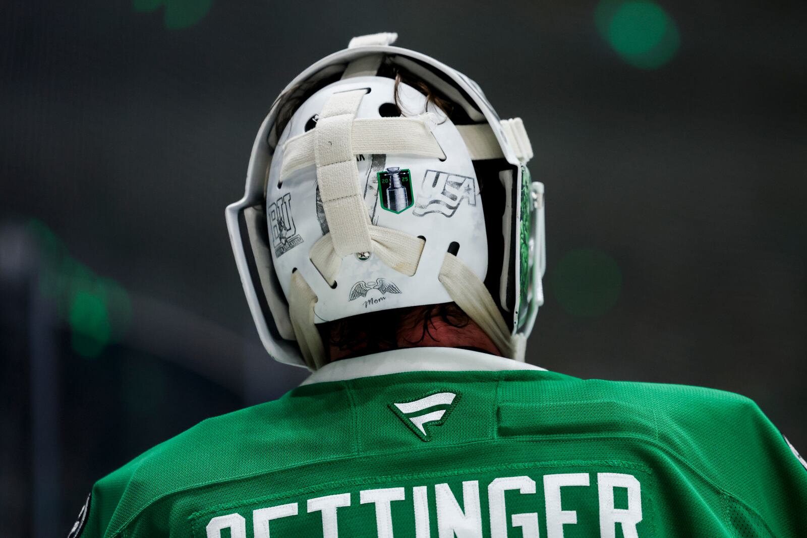 Dallas Stars goaltender Jake Oettinger (29) skates between periods during a first-round NHL hockey playoff game against the Colorado Avalanche in Dallas, Saturday, April 19, 2025. (AP Photo/Gareth Patterson)
