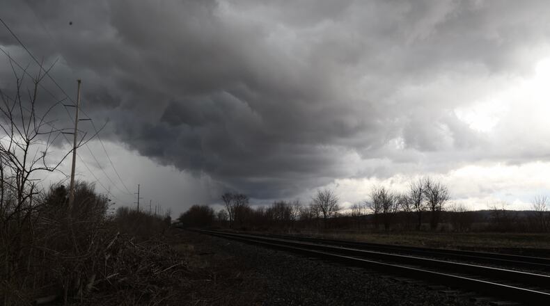 Storm clouds could be seen over Champaign County on Wednesday afternoon, March 23, 2022. BILL LACKEY/STAFF