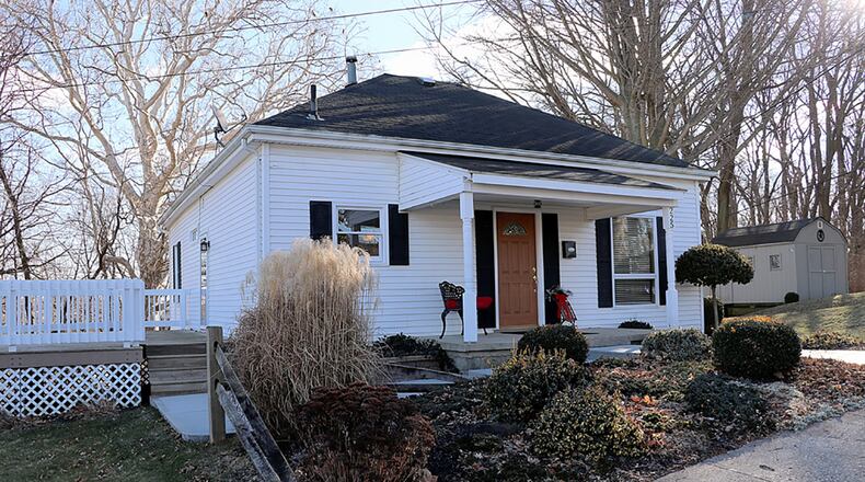 Using the landscape to its benefit, the updated bungalow with about 1,350 sq. ft. of living space has a flexible floor plan with a first-level main bedroom and several social areas that have exterior access to decks and patios. CONTRIBUTED PHOTO BY KATHY TYLER